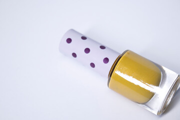 A bottle with blue nail polish on white background. nail lacquer. Nail manicure concept. Isolated, copy space. 