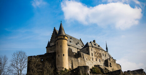 Fototapeta na wymiar Medieval Castle Vianden on the hill with blue sky ,Luxembourg