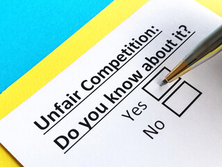 Obraz premium One person is answering question about unfair competition.