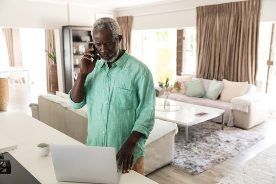 A senior African American man spending time at home
