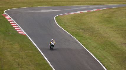 A shot of a racing bike on a track