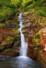 Beautiful Natural Cascading Waterfalls in Vibrant Landscape