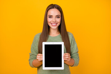 Portrait of cheerful confident cool girl hold tablet advise choose decide new gadget wear pullover...