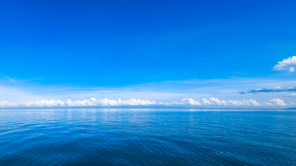 bright blue sky and calm sea