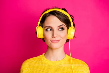 Foto op Aluminium Close-up portrait of her she nice attractive lovely cute charming cheery girl listening podcast playlist modern track isolated on bright vivid shine vibrant pink fuchsia color background © deagreez