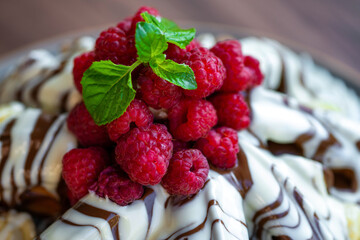 Sweet Waffles with milk chocolate, white chocolate, vanilla cream, strawberries, banana, vanilla ice cream sweet popcorn
