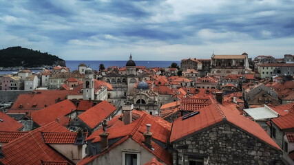 Fototapeta na wymiar Scenic view on the old city center of Dubrovnik, Croatia, old city background, amazing landscape with adriatic sea catched from the top of old ancient city wall