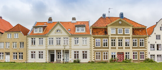 Panorama of historic houses on the dike in Gluckstadt