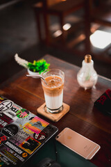 Naklejka na ściany i meble coffee with a blend of milk to accompany your work with ease