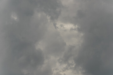 Stormy rain big fluffy clouds. Dark sky. Natural scenic abstract background. Weather changes backdrop. Sky filled with voluminous clouds.