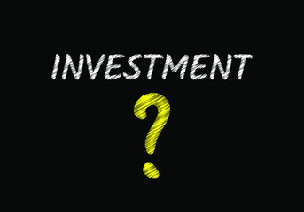 Investment writing on black chalkboard. Where to invest. Business concept
