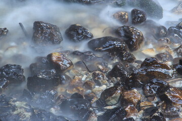 Close up of river and small rapids, wild water, dangerous nature.