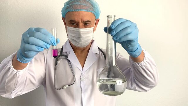 scientist, virologist, doctor in uniform creates a vaccine, new medicine, elixir of youth, conducts a scientific experiment, research, the concept of DNA, test and treatment of coronavirus, COVID-19