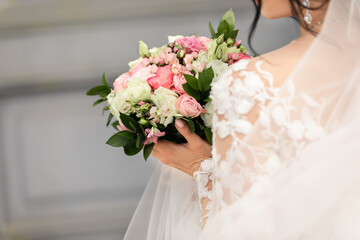 Bride with wedding bouquet at wedding day