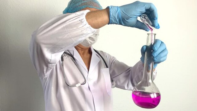 scientist, virologist, doctor in uniform creates a vaccine, new medicine, elixir of youth, conducts a scientific experiment, research, the concept of DNA, test and treatment of coronavirus, COVID-19