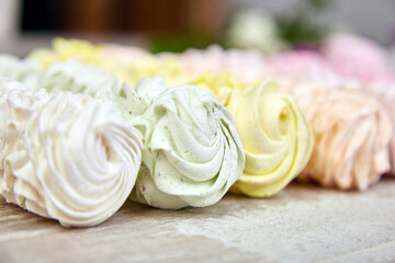 Obraz na płótnie Canvas Sweet homemade marshmallow, background from multicolor pastel zephyr