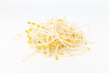 Yellow sprouts on white background