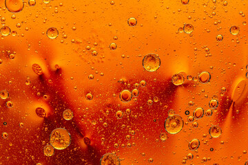 Abstract colorful background with oil drops and waves on water surface