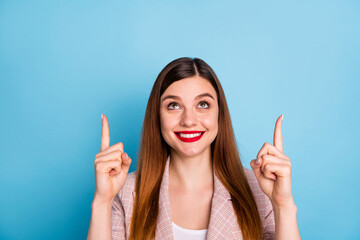 Portrait of positive confident girl promoter point index finger up copyspace demonstrate ads...