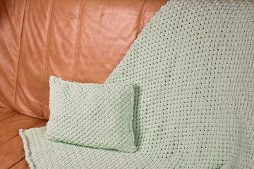 knitted pillow and handmade plaid