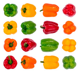 Healthy organic fresh vegetables. Set of bell peppers of different colors and in different positions with water drops, isolated on white background