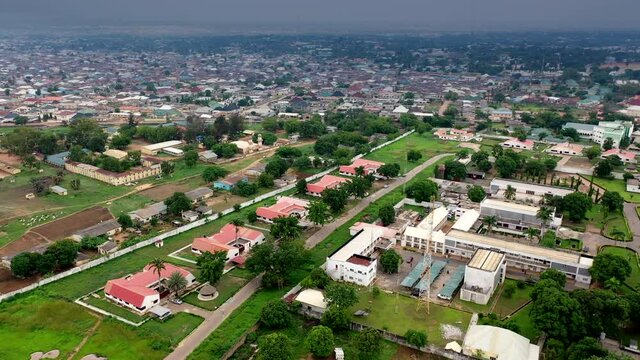 Aerial view of the upscale suburb and business district of Kaduna, Nigeria and the highway
