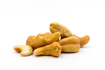 Roasted salted cashew nuts isolated on white background