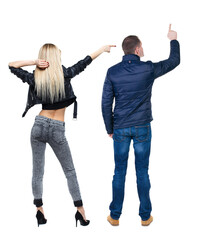 Back view of two pointing girl in winter jacket.