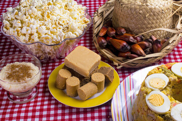 Typical Brazilian junina party food and sweets. Couscouz, peanut candy, sweet rice, dulces de leche...