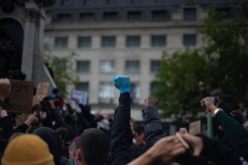 Gloved fist protest