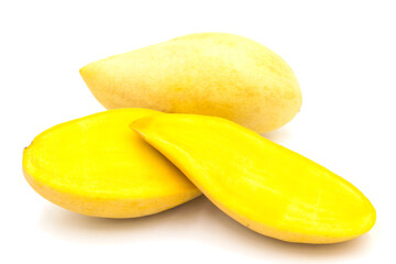Fototapeta na wymiar Ripe yellow mango fruit​ (Barracuda​ mango)​ with​ sliced​ isolated on​ white background
