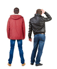 Back view of couple in winter jacket.