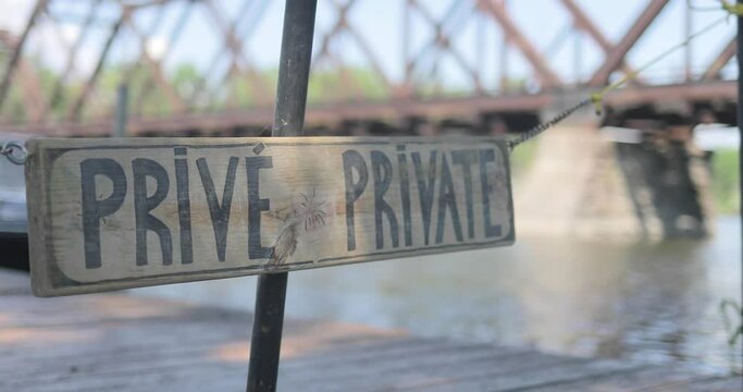 Private sign with a warf