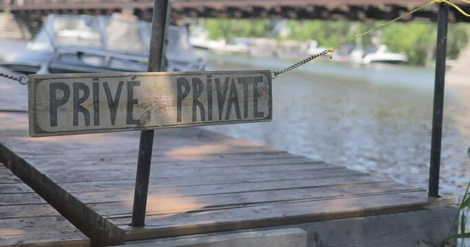 Private sign with a warf