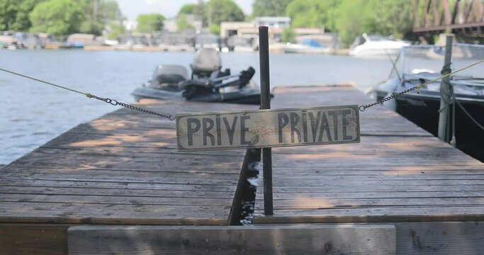 Private sign with a warf
