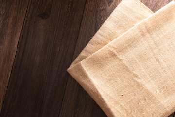 ジュートと木製の背景