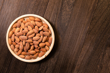 Delicious looking almonds and atmospheric background