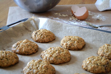 Fototapeta na wymiar Homemade healthy oatmeal cookies with raisins and chia on the table. 