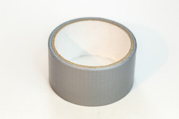 Roll of silver gaffer tape on white background (gaff tape)