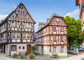 Fototapeta na wymiar Two half timbered houses in the historic center of Limburg an der Lahn