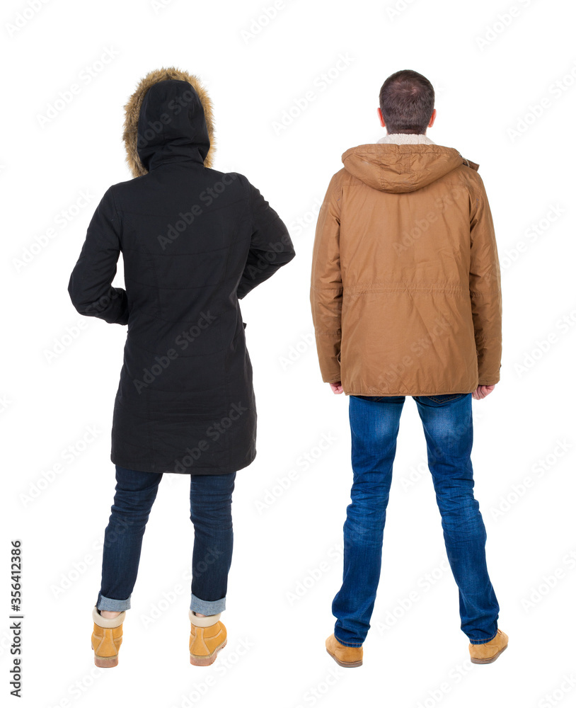 Poster Back view of couple in winter jacket.