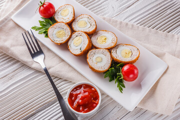 Scotch egg meat balls on rustic wooden background
