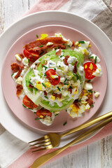 iceberg wedge salad on plates, top view
