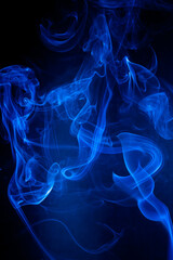Fototapeta premium Blue smoke motion on black background.