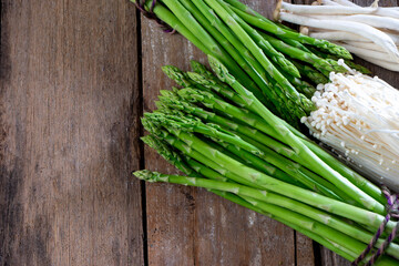 Group of Fresh asparagus mushroom on the wood