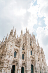 Fototapeta na wymiar MILAN, ITALY - May 29, 2018: street view of Milan Cathedral, Dome de Milan is the cathedral church