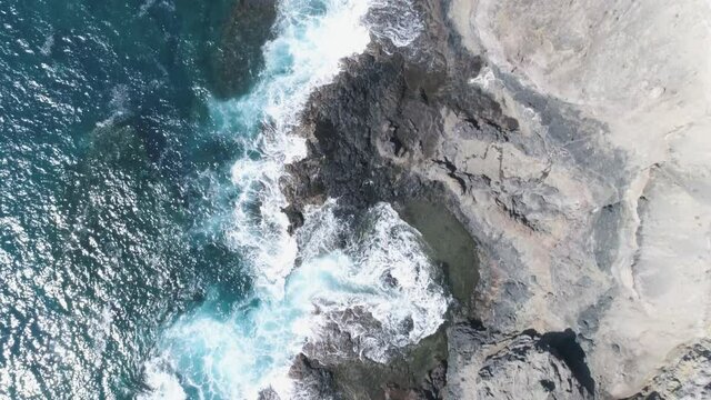 Bird eye areal slow motion drone shot of coastline of Canary Island in Gran Canaria