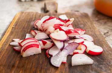 Sliced radish on a wooden Board.