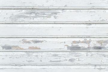 White painted rustic wood planks background with flaking paint. Stavanger, Norway.