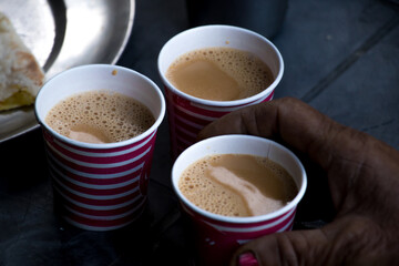 Image of tea in a cup and a glass